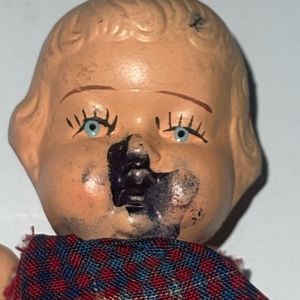 Vintage porcelain or ceramic doll made in Japan.